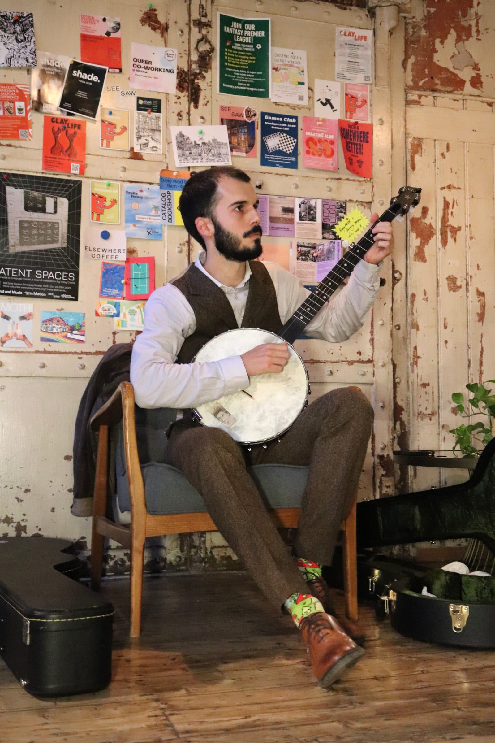 Local artist singing and plating the banjo. 